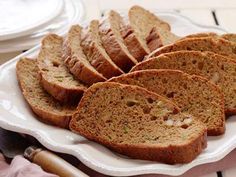 sliced loaf of bread on a white plate