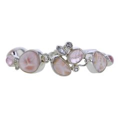 one of a kind Sterling Silver bracelet adorned with white Topaz, Morganite and pink Natrolite cabochons this is one stunning statement piece artisanally hand built around the spectacular crystals adjustable width overall length of bracelet approximately 7" to 8" long approximate dimensions of largest pink Natrolite: 1/2" x 5/8" ONE OF A KIND Morganite weight: 7.3 cts white Topaz weight: 0.5 cts pink Natrolite weight: 21.2 cts FREE SHIPPING WITHIN MAINLAND US! Adjustable Multi-stone Unique Bracelet, Adjustable Multi-stone Bracelet, Adjustable Pink Opal Bracelet, Pink Opal Bracelet Jewelry, Unique Pink Bracelets With Natural Stones, Adjustable Bracelets With Gemstone Accents, Silver Link Bracelet, Amethyst Necklace Pendant, Stacked Earrings