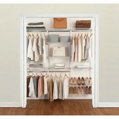 an organized closet with clothes and shoes