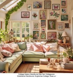 a living room filled with lots of furniture and pictures on the wall above it's windows