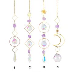 four different types of wind chimes hanging from chains with sun, moon and crescent charms