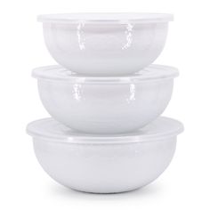 three white bowls stacked on top of each other