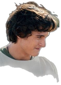 a close up of a person wearing a white shirt and green hat with his hair in the wind