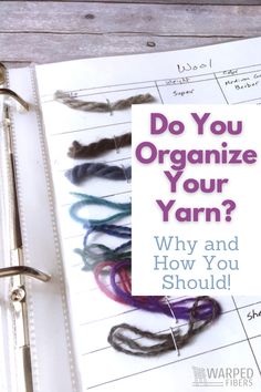 an open binder with yarn and scissors on it, next to a clipboard that says do you organize your yarn?