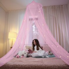 PRICES MAY VARY. CANOPY FIT FOR A PRINCESS: With 46 medium and 23 large glow-in-the-dark stars sprinkled across a pretty, pink mesh netting, this beautiful, magical canopy will truly make any little girl in your life feel like a real princess! The stars—which are made of eco-friendly materials and use advanced adhesive technology to adhere to the net—glisten and glow for a whimsical bed time experience every night. SAFE, FUNCTIONAL, VERSATILE: 100% polyester (a flame-retardant material) with 156 Canopy For Bed, Pink Bed Canopy, Pink Princess Room, Girls Bed Canopy, Princess Canopy, Princess Room Decor, Canopy Bed Curtains, Bedroom 2024, Pink Bed