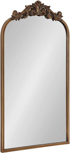 an ornate gold framed mirror on a white background