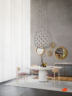 a white table and some chairs in a room