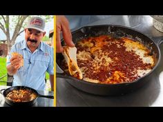 a man in a blue shirt is cooking some food on the grill and another has a spatula