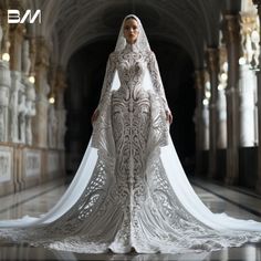 a woman in a white wedding dress with an intricate veil on her head and shoulders