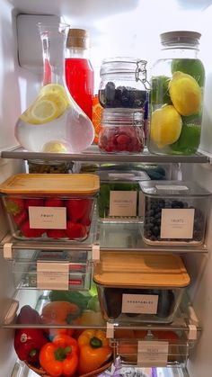 an open refrigerator filled with lots of different types of fruits and vegtables