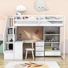 a child's bedroom with a loft bed and desk