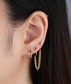 Introducing our Basic Double Chain Earring, a must-have for any fashion-forward individual. The two basic earrings, one large and one small, are delicately connected by a double chain, creating a modern and cool look. Embrace your unique style and stand out from the crowd with this chic accessory. Details: -Material: gold plated with internal stainless steel or stainless steel -Gauge: 18g | 1.0mm-Internal diameter: 8mm & 10mm -Chain length: 45.1mm-Include: single item -Required 2 ear piercings * All Ear Piercings, 2 Ear Piercings, Basic Earrings, Helix Hoop, Chain Earring, Ear Style, Don't Settle, Double Chain, Chic Accessories