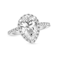 Bold and timeless, this diamond engagement ring ensures an unforgettable moment. Fashioned in sleek platinum, this beautiful look dazzles with a 2-1/2 ct. GIA-graded pear-shaped diamond boasting a color rank of I and clarity of Si2. Round diamonds line the frame and shank for a thoroughly sparkling design. Breathtaking with 2-7/8 cts. t.w. of diamonds and a bright polished shine, this engagement ring is worthy of her affection. This style arrives with a certificate that includes a photo and desc Pear Shaped Engagement Rings, Diamond Frame, Pear Cut Diamond, Engagement Rings Platinum, Pear Shaped Diamond, Dream Ring, Pear Cut, Diamond Engagement Ring, Eternity Ring