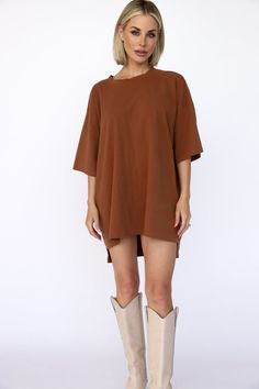 Our oversized t-shirt dress is the perfect cozy/casual dress. You can wear it by itself as a dress or with our V Cute Leather Pants as an oversized tee.  Color: Rust  Care: Delicate wash cold, lay flat to dry.  25” from the neck to the bottom front 30.5” from neck to bottom of back based on size small Material: 100% Co Oversized Crew Neck T-shirt Dress For Spring, Relaxed Fit Short Sleeve Tunic For Loungewear, Oversized Casual T-shirt For Daywear, Oversized Short Sleeve Tunic For Loungewear, Oversized Short Sleeve T-shirt Dress, Oversized Casual T-shirt Dress With Short Sleeves, Casual Oversized T-shirt Dress With Short Sleeves, Oversized Casual T-shirt Dress For Fall, Oversized Casual Tunic For Loungewear