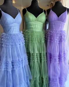 This formal gown boasts a delicate and elegant periwinkle color, made from tulle material. Its A-line silhouette and empire waistline, along with a pleated bodice and spaghetti straps, create a flattering fit. The full length tiered ruffles skirt adds a touch of luxury, and the lace-up back adds a stylish detail. SKU: 3479 Periwinkle color Tulle material A-line silhouette Empire waistline with pleated bodice, and spaghetti straps Full length tiered ruffles skirt Lace-up back Built-in bra Ship in Ruffles Skirt, Tulle Material, Periwinkle Color, Tiered Ruffle Skirt, Empire Waistline, Pleated Bodice, Formal Gown, Formal Gowns, Ruffles