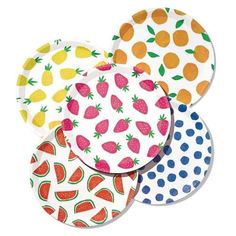 four paper plates with different designs on them