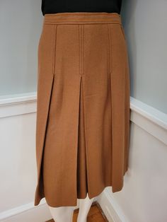 "Vintage Estee Laudar (sic) Lauder Estee Tokyo Lined Preppy Wool Pleated Midi Skirt XS Camel, tan, caramel color Marked Size 10, but runs very small. See measurements. Waist 24\" Hips 34\" Overall length from waist to hem 26\" Excellent vintage condition. Free shipping!" Tokyo Vintage, Vintage Preppy, Wool Skirt, Caramel Color, Wool Skirts, Pleated Midi Skirt, Caramel, Vintage Ladies, Camel