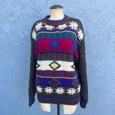 Vintage 90's Geometric abstract priny sweater. The perfect fall winter sweater. Mock Turtleneck. Nice rainbow colors. Dry clean. Size -Marked a small but great on many mediums. Oversized. Chest - 42 inches, Waist - 34 inches, Length - 26 inches.  Material - Acrylic, Wool, Viscose Brand - Magnet Condition - Great. No holes ,rips or stains. Gentle age in fabric. Cheers, Kerri Knit Rainbow, Geometric Sweater, Sweater Oversized, Sweater Oversize, Winter Sweater, Oversized Pullover, Mock Turtleneck, Geometric Abstract, Printed Sweater