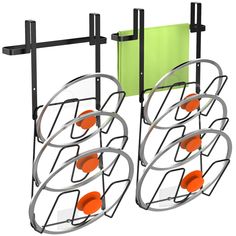 two metal racks with orange balls in them