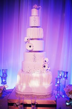 a wedding cake sitting on top of a table