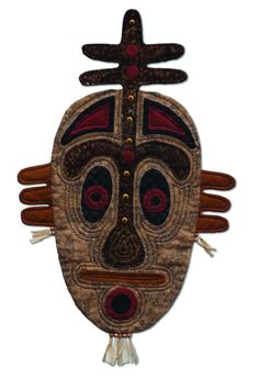 an image of a mask made out of wood