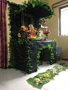 there is a small shrine made out of plants