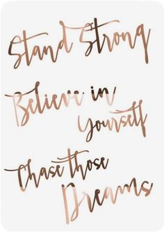 the words stand strong, believe in yourself, and those dreams are handwritten on white paper