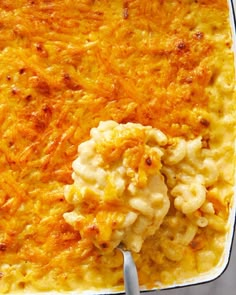 a casserole dish with cheese and macaroni in it, ready to be eaten