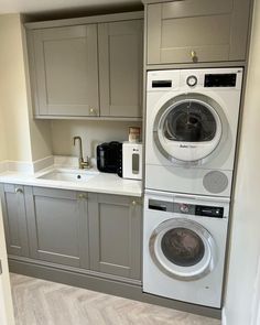 a washer and dryer in a small room