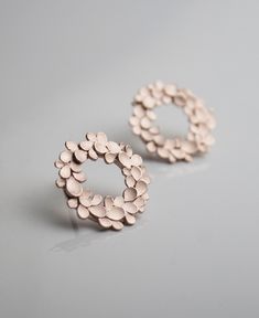 Silver and rose gold plated halo Earrings from my Floral wreath collection. Approx. 1.5cm dia. Wreath Earrings, Phenomenal Woman, Halo Earrings, Rose Earrings, Rose Gold Earrings, Jewelry Projects, Gold Gold, Jewelry Earrings Studs, Statement Jewelry