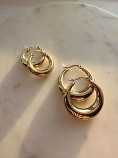 ❤ 20MM Chunky Hoop Earrings: A hug to brighten your day! These wide, round huggie hoop earrings are done in copper for unparalleled sophistication. Simple and chic, they add a perfect finishing touch to your look. ❤ Gold Hoop Earrings: A versatile addition to any jewelry line-up, mix and match with the other gold hoops for an elevated take on a good look of classic jewelry. ❤ Thick Wide Huggie Hoops: The chunky hoops diameter is 0.8", width is 0.43in, single weight is 0.19oz. Lead and nickel-free. Easy to wear while putting on and taking off your mask. ❤ Gifts Idea: Surprise your girl or friend with the gold classic hoop earrings as anniversary, birthday, or Christmas gifts. Makes friendly! ❤ 30 Days Money Back Guarantee: Any quality problem within 30 days, replacement or refund will be pr Etsy Gold Earrings, Cute Golden Jewelry, Gold Hoop Earrings Chunky, Golden Hoop Earrings Aesthetic, Gold Hoops Chunky, Chunky Gold Jewellery, Golden Earrings Hoop, Gold Jewelry Aesthetic Earrings