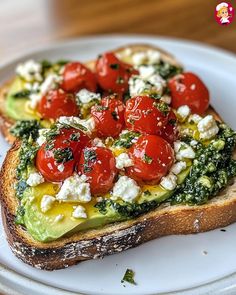 Avocado Feta Toast Delight Hummus Avocado Toast, Avocado Feta Toast, Avocado Toast With Tomatoes, Feta Toast, Mediterranean Lunches, Toast Ideas, Grain Bread, Bruschetta Recipe, Breakfast Bites