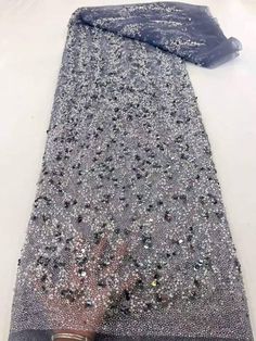 This high quality Fabric is measured in 5 Yards With Embroidered Beading and Sequin. It is soft, very delicate and beautiful. This high Quality Fabric is made with Fashion embroidered rhinestones can be used in making party wedding dresses, skirts, shawls, scarves and other other fashion apparels as you would like. Size : Length : 5 yards (180 inch). Width: 50 inch (Please allow slight deviation for the measurement data ,±1 inch) Material: 100% Polyester, Tulle Lace Fabric, Eco-Friendly embroide Tulle Lace, Fashion Fabric, Wedding Party Dresses, Lace Fabric, Party Wedding, 1 Inch, Quality Fabric, Shawl, Wedding Party