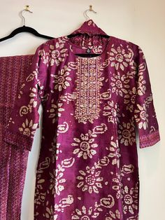 3 pc Maroon Purple Gold Floral Suit women clothing. This 3 pc Maroon Purple Gold Floral Suit is the perfect way to make a statement. The sophisticated purple 3 pc set contains a long-sleeved top, trousers, and a matching dupatta . creating an elegant look that stands out from the crowd. Festive Purple Palazzo Set With Long Sleeves, Festive Purple Long Sleeve Palazzo Set, Purple Long Sleeve Palazzo Set For Festive Occasion, Festive Long Sleeve Purple Palazzo Set, Elegant Purple Cotton Sets, Purple Cotton Sets With Printed Motifs, Festive Purple Straight Kurta Set, Purple Cotton Salwar Kameez With Straight Kurta, Purple Cotton Straight Kurta Salwar Kameez