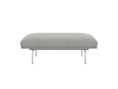 the footstool is upholstered with metal legs and a beige fabric cover