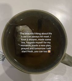 a tea cup with a poem written on it