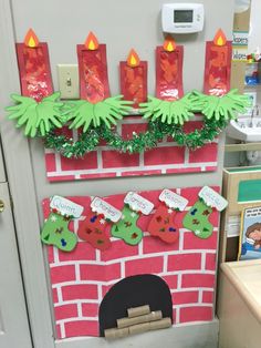 a fireplace decorated with christmas stockings and stockings