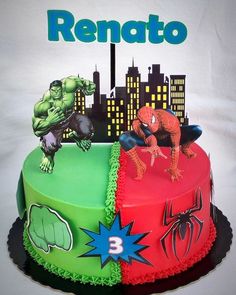 a birthday cake decorated with the hulk and spiderman characters