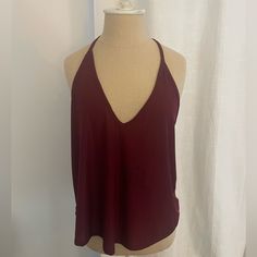 Free People Tank Top In Maroon, Never Worn Free People Tank Top, Free People Tank, Crochet Halter Tops, Ribbed Crop Top, Flowy Tank, Maroon Color, Free People Sweater, Distressed Black Jeans, Polo Dress