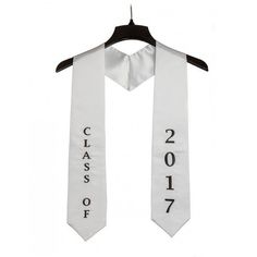 a white neck tie with the words class of 2017 on it hanging from a hanger