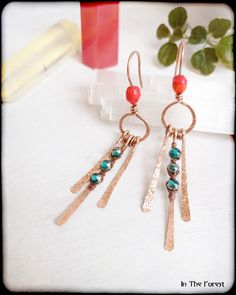 Earrings made of copper, with coral red Indian crystal beads and Czech crystal beads. It has an aged patina, protected by a layer of metal varnish. Handmade hooks. Measurements: 8.1cm x 1.4cm approx.  Weight: 3gr. approx Thank you for visiting my store!! Bohemian Red Earrings With Natural Stones, Red Copper Earrings, Artisan Red Copper Earrings, Wire Jigs, Beach Jewelry Boho, Bleu Turquoise, Czech Crystal, Earrings Red, Handmade Boho