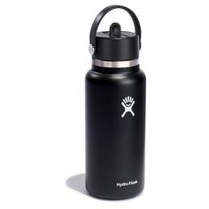 the hydro flask water bottle is black and has a handle on it's side