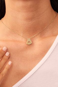 Crafted in Italy from exquisite 14k gold, our Icon Heart Pendant Necklace offers a dazzling play of light that captures attention with every movement. Delicate cut-out hearts line the rim for a little romance, while a handcrafted design adorns the surface for some sophistication. Metal: 14k Yellow Gold Charm Dimensions: 15mm Tall, 15mm Wide Chain Dimensions: 1.2mm Thick, 18 Inches Long, Adjustable to 16 or 17 Inches Construction: Lobster Clasp, Rolo Chain Weight: 2.1 Grams Origin: Crafted in Are Yellow Gold Double Heart Tarnish-resistant Jewelry, 14k Gold Heart Necklace With Diamond Cut, Dainty Yellow Gold Heart Necklace With Diamond Cut, Gold Double Heart Diamond Jewelry, Gold Heart Pendant Jewelry With Diamond Accents, Fine Jewelry Yellow Gold Double Heart, Gold Heart Pendant Necklace With Brilliant Cut, Yellow Gold Double Heart Jewelry With Diamond Accents, Yellow Gold Double Heart Jewelry With Polished Finish