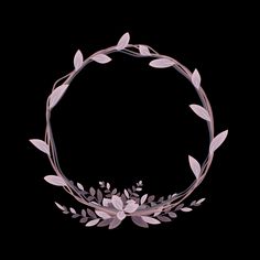 a circular frame made out of leaves and branches on a black background with the center surrounded by pink flowers