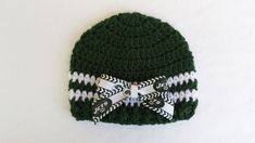 a crocheted hat with a bow on it