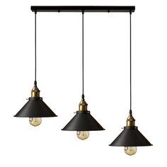 three black and gold pendant lights hanging from the ceiling