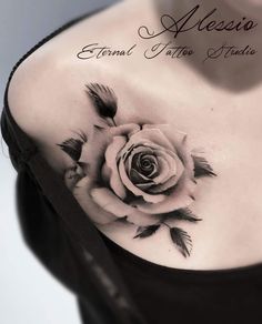 a woman with a rose tattoo on her chest