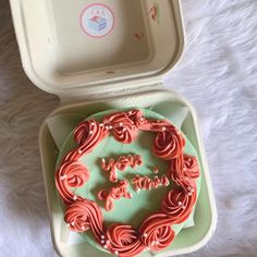 there is a cake in the shape of a circle on top of a plate with writing