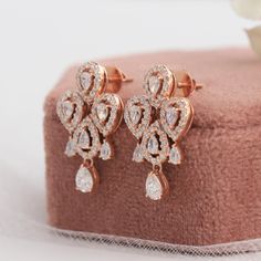 || Note: The Listed Earrings Is Made With Only 14KT Rose Gold And the Back Type Is Screw Back|| ✤ 𝐃𝐢𝐚𝐦𝐨𝐧𝐝 𝐃𝐞𝐭𝐚𝐢𝐥𝐬↦ Color: EF↦ Clarity: VS↦ Shape: Pear Cut↦ Stone Size: 4.70*3.15 MM (± 0.05 MM)↦ Carat Weight: 0.35 TCW (± 0.05 CT)↦ Making Process: Handmade - Crafted by our experienced team↦ Type: Lab-Grown Diamond✤ 𝐃𝐢𝐚𝐦𝐨𝐧𝐝 𝐃𝐞𝐭𝐚𝐢𝐥𝐬↦ Color: EF↦ Clarity: VS↦ Shape: Pear Cut↦ Stone Size: 3.10*1.95 MM (± 0.05 MM)↦ Carat Weight: 0.55 TCW (± 0.05 CT)✤ 𝐃𝐢𝐚𝐦𝐨𝐧𝐝 𝐃𝐞𝐭𝐚𝐢 Rose Gold Pear-shaped Earrings For Anniversary, Luxury Rose Gold Cluster Earrings For Anniversary, Luxury Rose Gold Cluster Earrings For Formal Occasions, Luxury Rose Gold Cluster Earrings For Formal Events, Fine Jewelry Rose Gold Cluster Earrings With Cubic Zirconia, Rose Gold Cubic Zirconia Cluster Earrings Fine Jewelry, Rose Gold Cubic Zirconia Cluster Earrings For Formal Occasions, Formal Rose Gold Cluster Earrings With Cubic Zirconia, Luxury Teardrop Cluster Earrings For Weddings