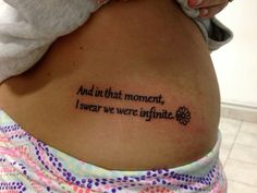 a woman with a tattoo on her stomach saying and in that moment, i swear we're infinite